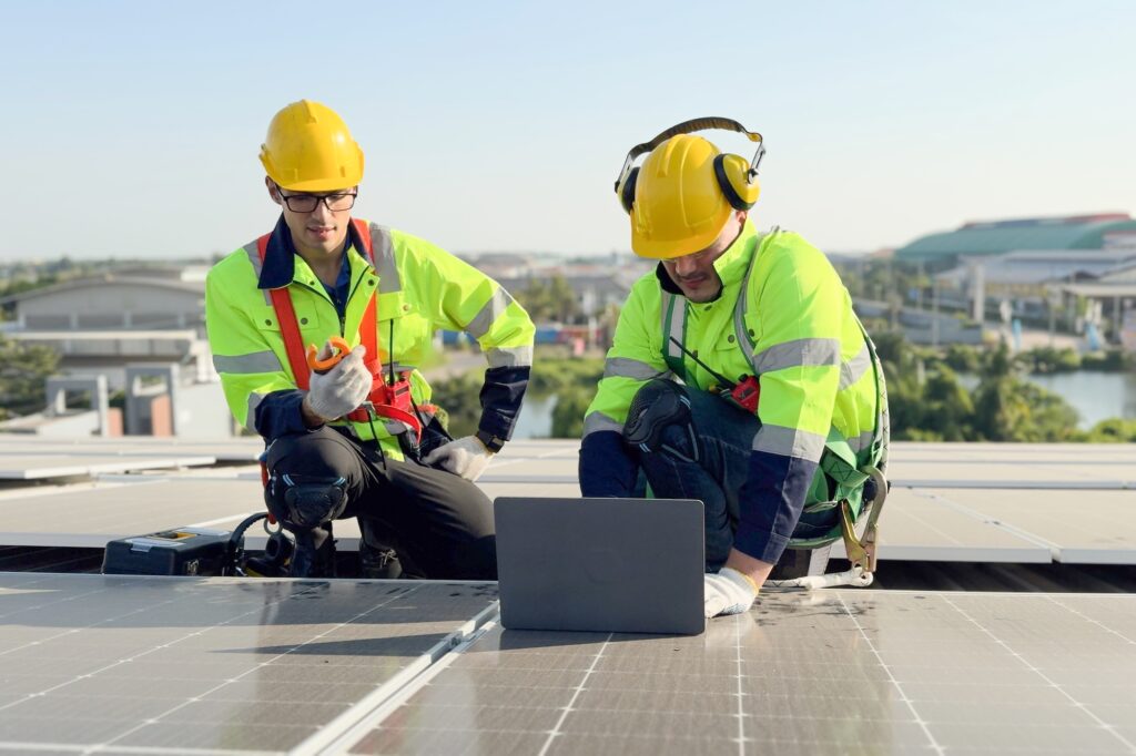 Electricians Working on Solar Panels
